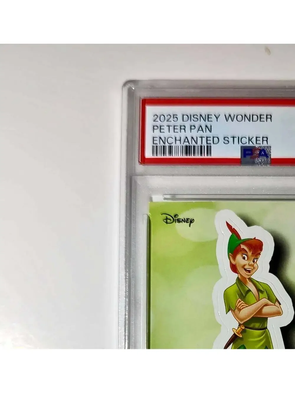 Peter Pan 2025 Topps Disney #ES-8 Enchanted Sticker Card Peter Pan PSA 8